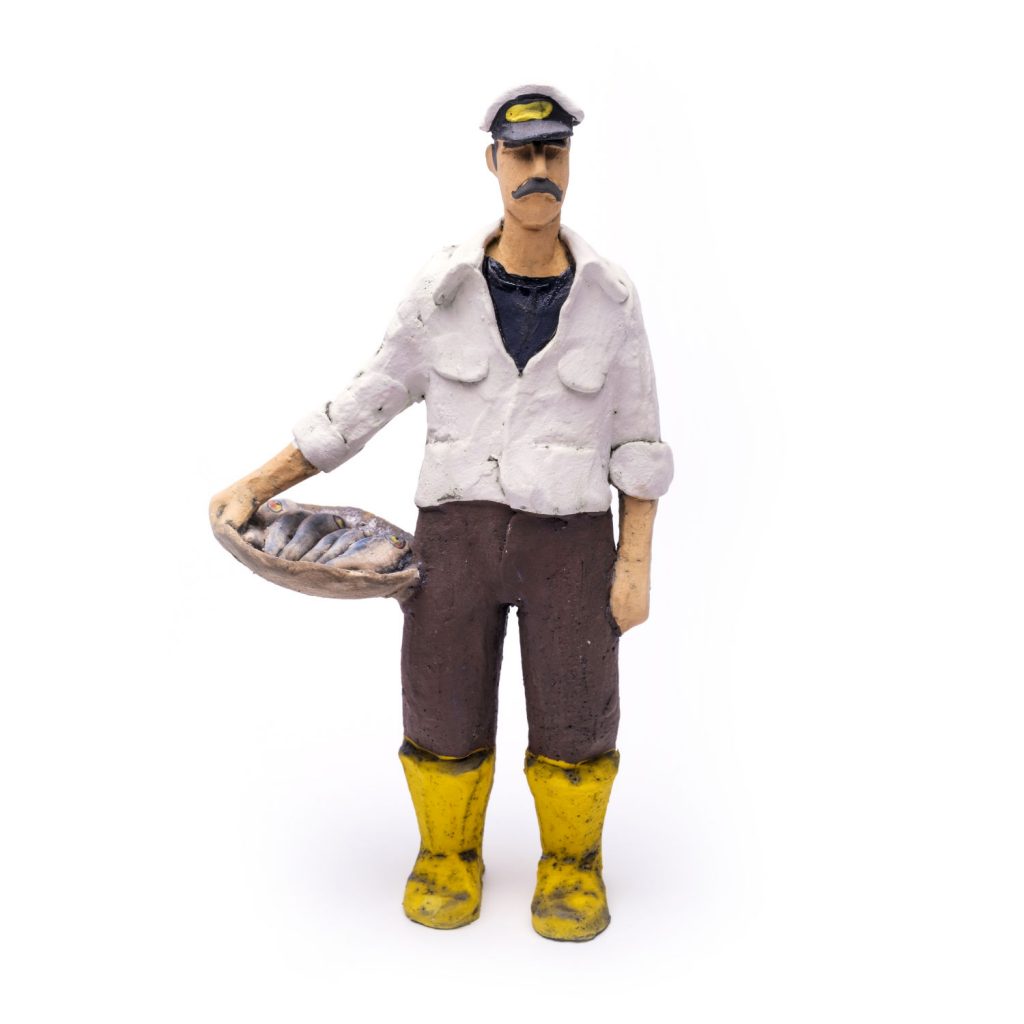 ceramic figure fisherman with panceramic figure cook