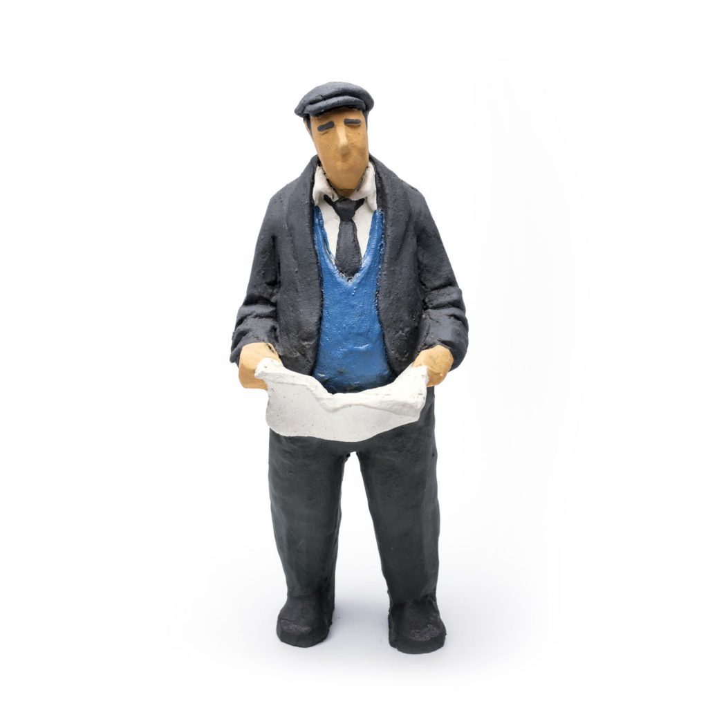 ceramic figure man with newspaperceramic figre captain