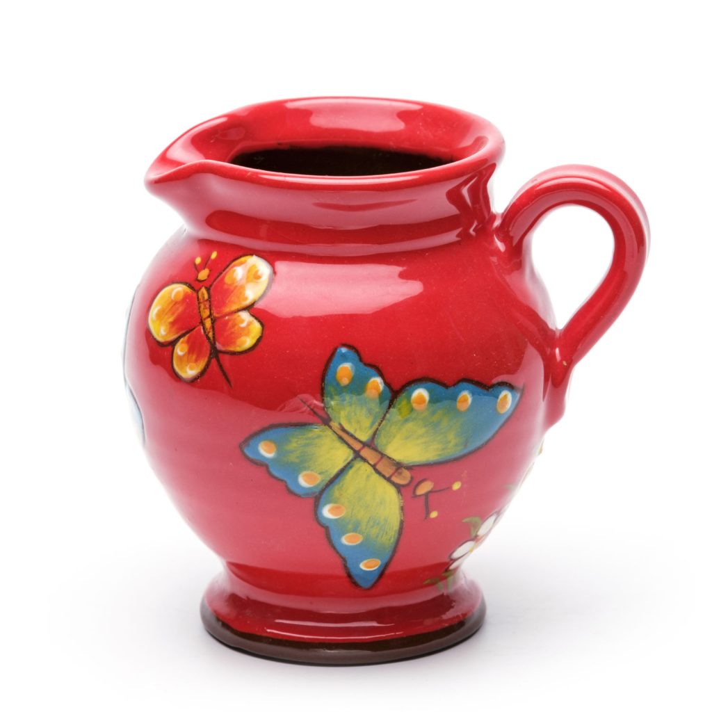 milk jug red butterfly